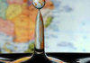 Just a waterdrop infront of a worldmap