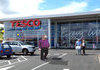 Protester seen outside Tesco