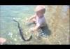 Russian Baby Playing With A Snake